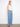 The belted design of these jeans adds a chic touch, ensuring a tailored fit that flatters the figure. By Charlie B.