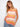 This crochet tank top in apricot features a stylish scoop neckline, perfect for casual outings. Designed by Charlie B.
