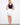 This skirt features a slim fit design with built-in shorts, offering comfort and style for any occasion by Charlie B.