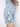 These light blue shorts showcase beautiful side embroidery on stretch denim fabric for flexible wear by Charlie B.