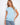 Light blue cotton top with a chic crew neckline, perfect for casual outings. Designed for comfort and style by Charlie B.