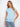 Light blue cotton top with a chic crew neckline, perfect for casual outings. Designed for comfort and style by Charlie B.