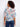 The side tie at the hem of this floral top offers an adjustable fit and adds a touch of flair to your look by Charlie B.
