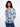 Blouse with floral motif, featuring a Henley neckline and adjustable roll-up sleeves for versatile styling by Charlie B.