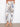 Jogger pants for women in blue and beige floral print, showcasing two side pockets and an elastic waistband by Charlie B.
