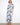 Maxi dress with a V-neck and intricate pattern, featuring a faux wrap design for elegance by Charlie B.