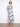 A flowing maxi length adds grace to this stunningly patterned dress with dolman sleeves by Charlie B.