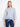 Chic blue blouse with 3/4 roll-up sleeves and delicate embroidery for a versatile look by Charlie B.