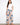 Floral pants featuring a self belt tie, perfect for adding a touch of elegance to any outfit. Designed by Charlie B.