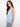 Elegant sleeveless design in light fabric, highlighted by button detailing along the side for added flair. By Charlie B.
