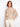 The blouse features a split notch neckline, enhancing its stylish appeal with a touch of elegance. By Charlie B.