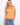 Orange top with a ribbed texture, offering a semi-fitted silhouette for a flattering look. Perfect for everyday wear by Charlie B.